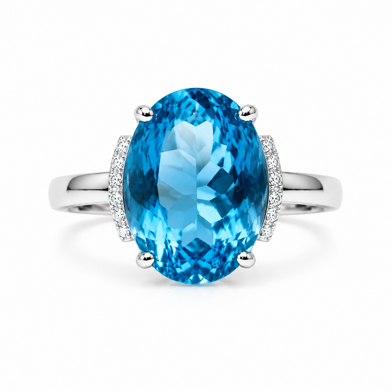 Natural Swiss Blue Topaz ring featuring a 12x16mm oval gemstone with cubic zirconia accents in platinum-plated sterling silver.