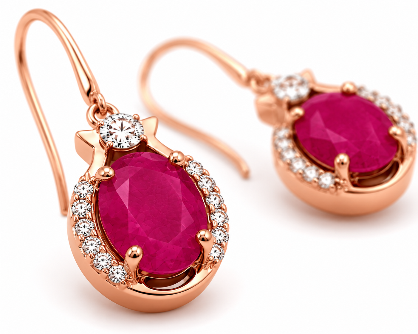 Natural bright pink opaque ruby drop earrings with 6x8mm oval gemstones, cubic zirconia halo, platinum plated 925 sterling silver on a white background.