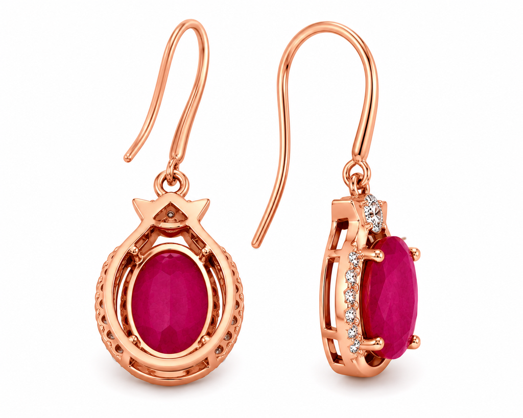 Natural bright pink opaque ruby drop earrings with 6x8mm oval gemstones, cubic zirconia halo, platinum plated 925 sterling silver on a white background.