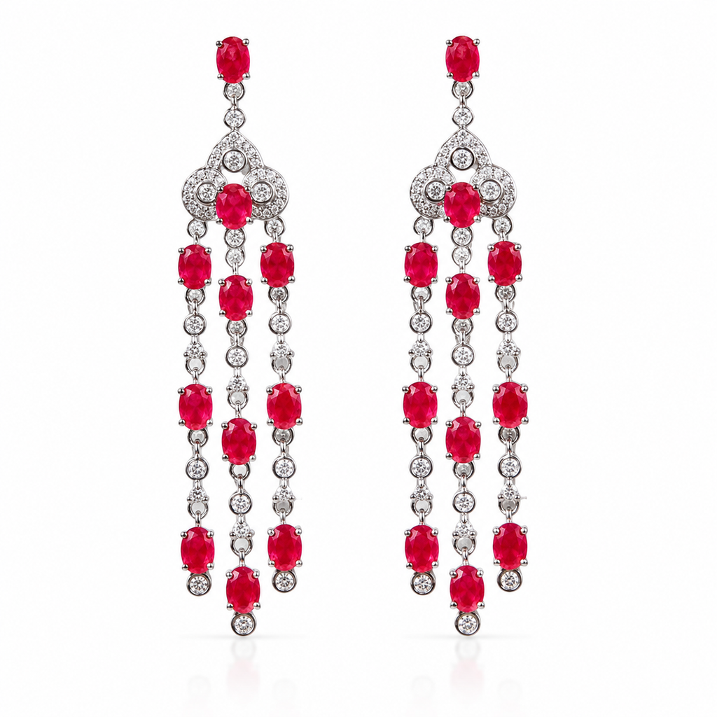Natural ruby chandelier drop earrings featuring genuine 3x4mm oval rubies, cubic zirconia accents, and platinum plated 925 sterling silver on a white background.