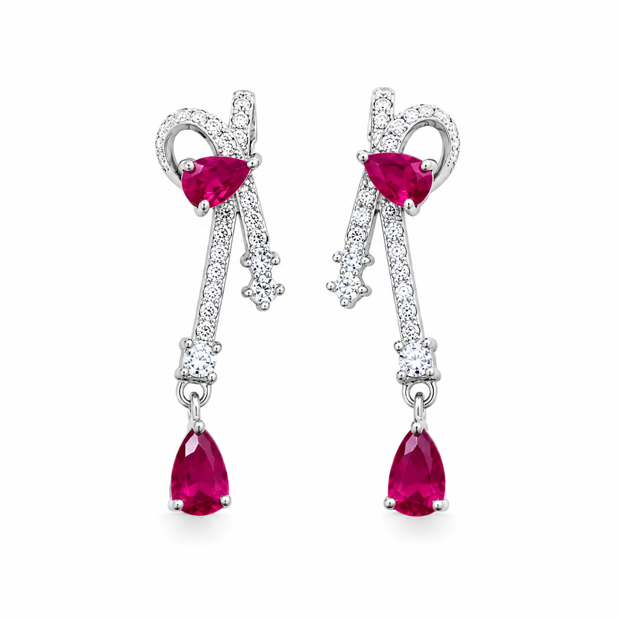 Natural ruby pear drop earrings with cubic zirconia accents in platinum plated 925 sterling silver on a white background.