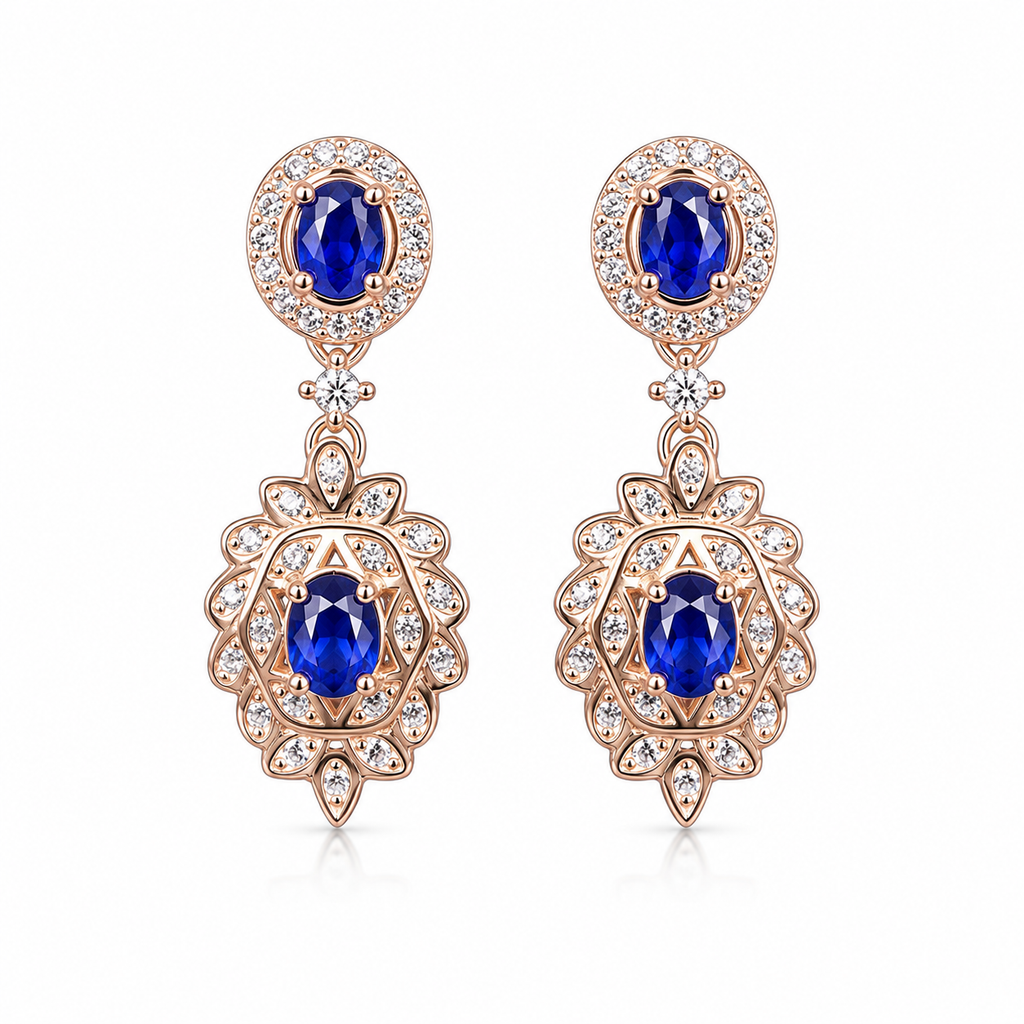 Natural Blue Sapphire elegant dangle earrings in 925 sterling silver featuring four VVS Grade 3×4 mm oval sapphires with sparkling cubic zirconia accents