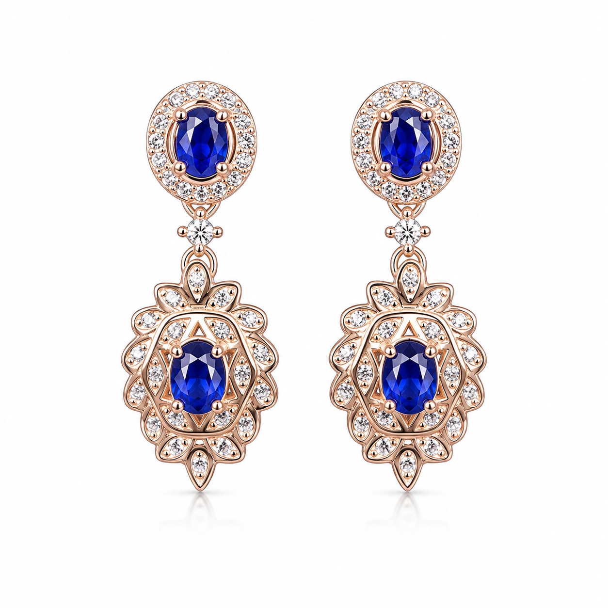 Natural Blue Sapphire elegant dangle earrings in 925 sterling silver featuring four VVS Grade 3×4 mm oval sapphires with sparkling cubic zirconia accents