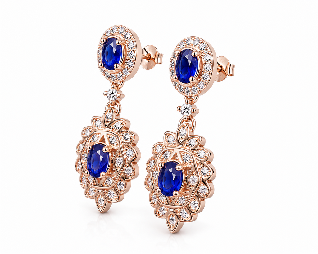 Natural Blue Sapphire elegant dangle earrings in 925 sterling silver featuring four VVS Grade 3×4 mm oval sapphires with sparkling cubic zirconia accents