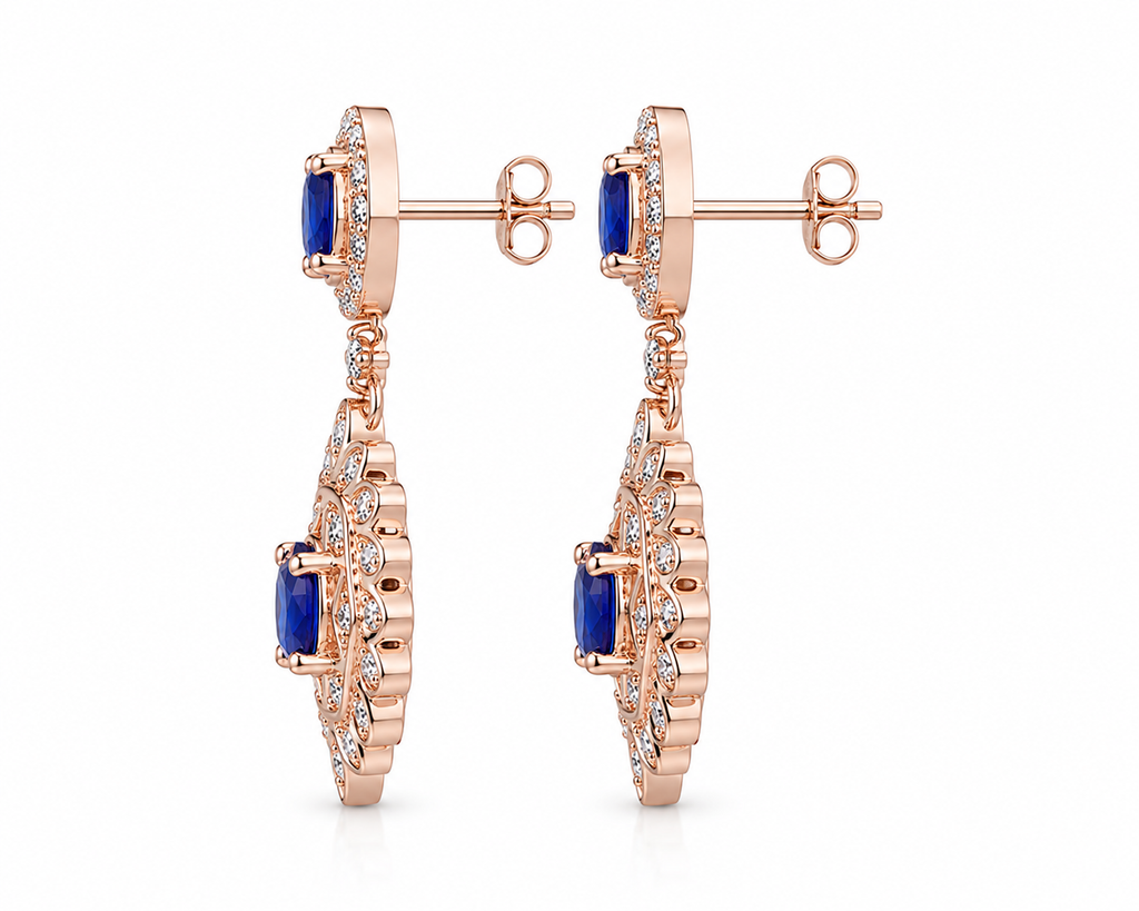 Natural Blue Sapphire elegant dangle earrings in 925 sterling silver featuring four VVS Grade 3×4 mm oval sapphires with sparkling cubic zirconia accents