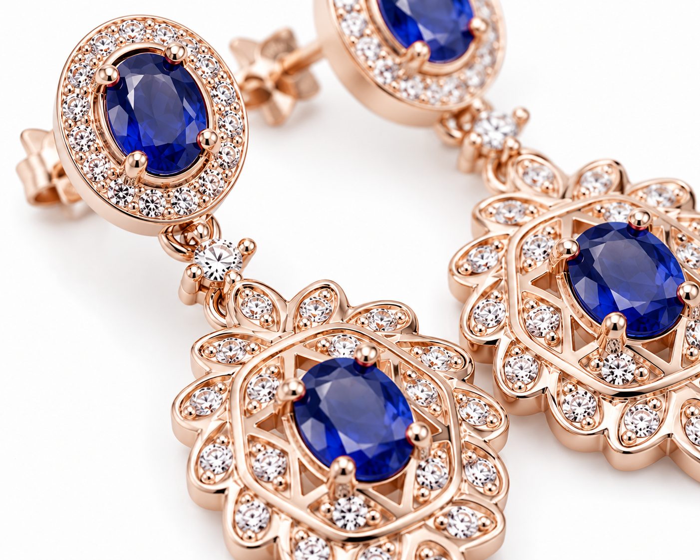 Natural Blue Sapphire elegant dangle earrings in 925 sterling silver featuring four VVS Grade 3×4 mm oval sapphires with sparkling cubic zirconia accents