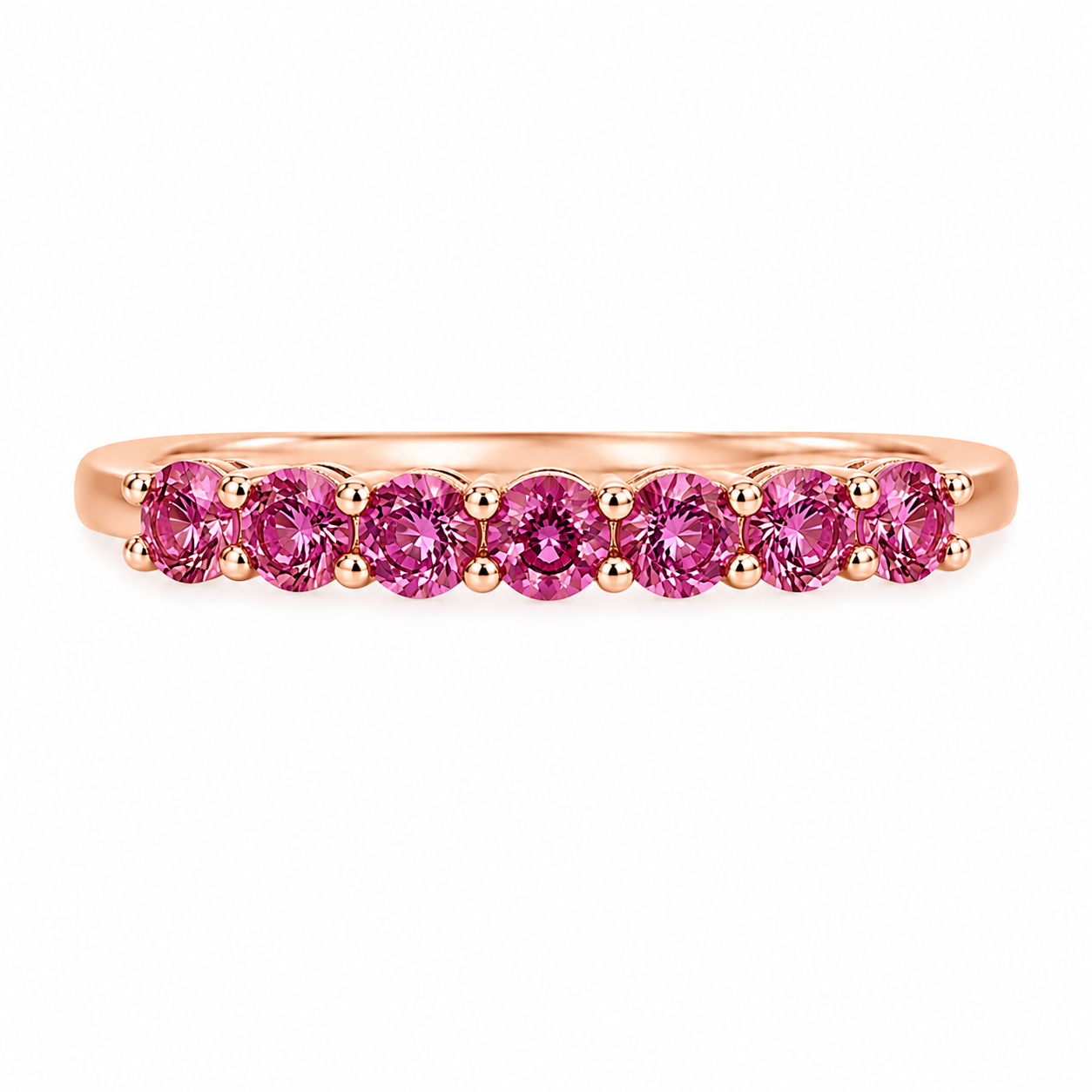Natural Pink Garnet half eternity ring featuring seven genuine 3mm round pink garnets in rose gold plated 925 sterling silver on a white background.
