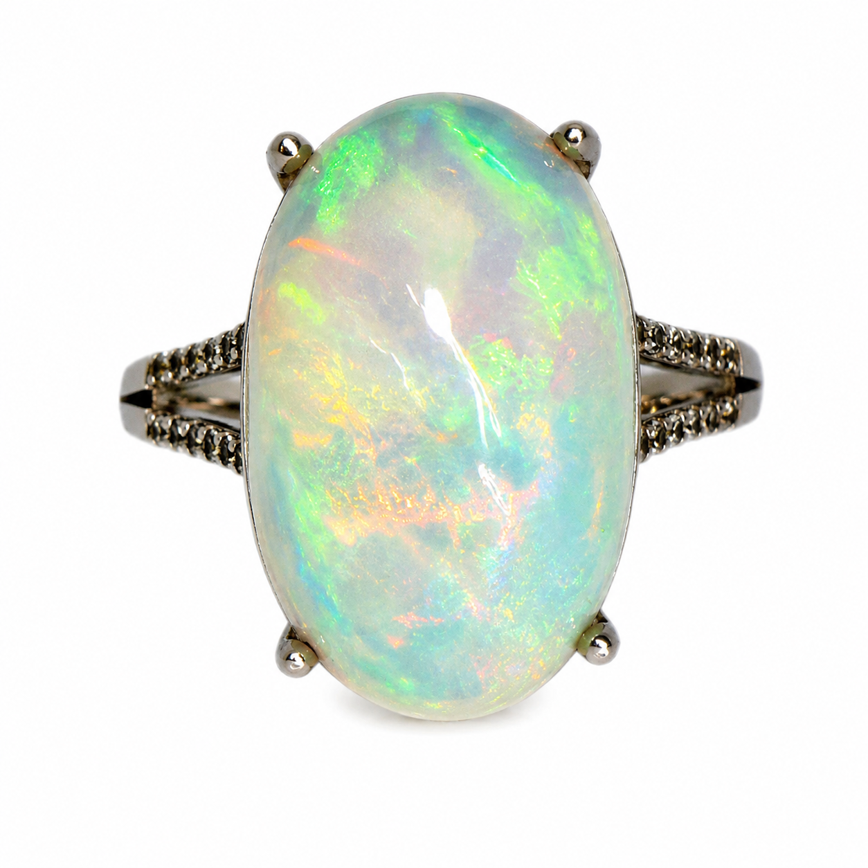 Natural Australian White Opal ring featuring a hand-selected 10–15 carat genuine opal in a sterling silver setting with cubic zirconia accents.