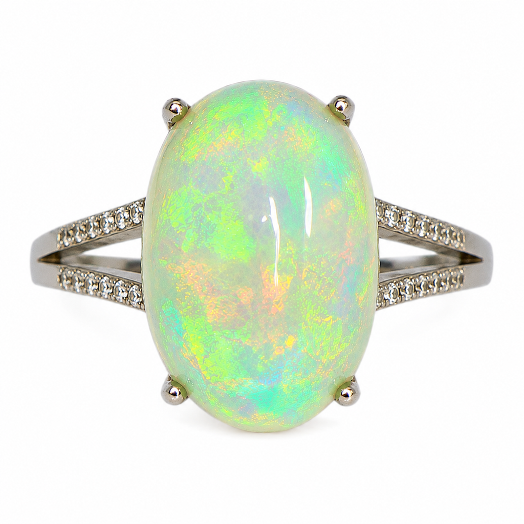 Natural Australian White Opal ring featuring a hand-selected 10–15 carat genuine opal in a sterling silver setting with cubic zirconia accents.