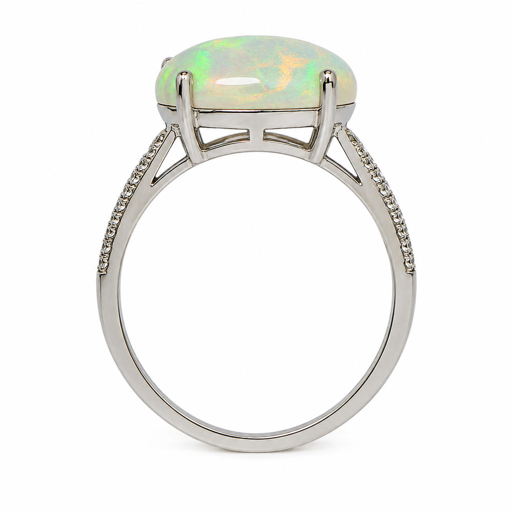 Natural Australian White Opal ring featuring a hand-selected 10–15 carat genuine opal in a sterling silver setting with cubic zirconia accents.