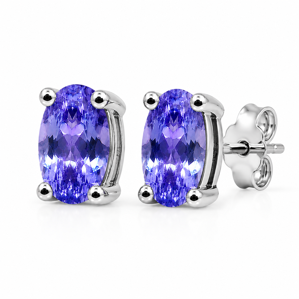 Natural Purple Tanzanite Halo Stud Earrings featuring 4x6mm oval genuine tanzanite gemstones in 925 sterling silver with sparkling cubic zirconia by Phimsera.