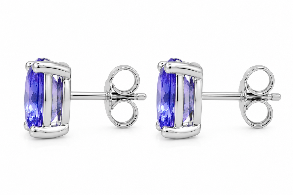 Natural Purple Tanzanite Halo Stud Earrings featuring 4x6mm oval genuine tanzanite gemstones in 925 sterling silver with sparkling cubic zirconia by Phimsera.