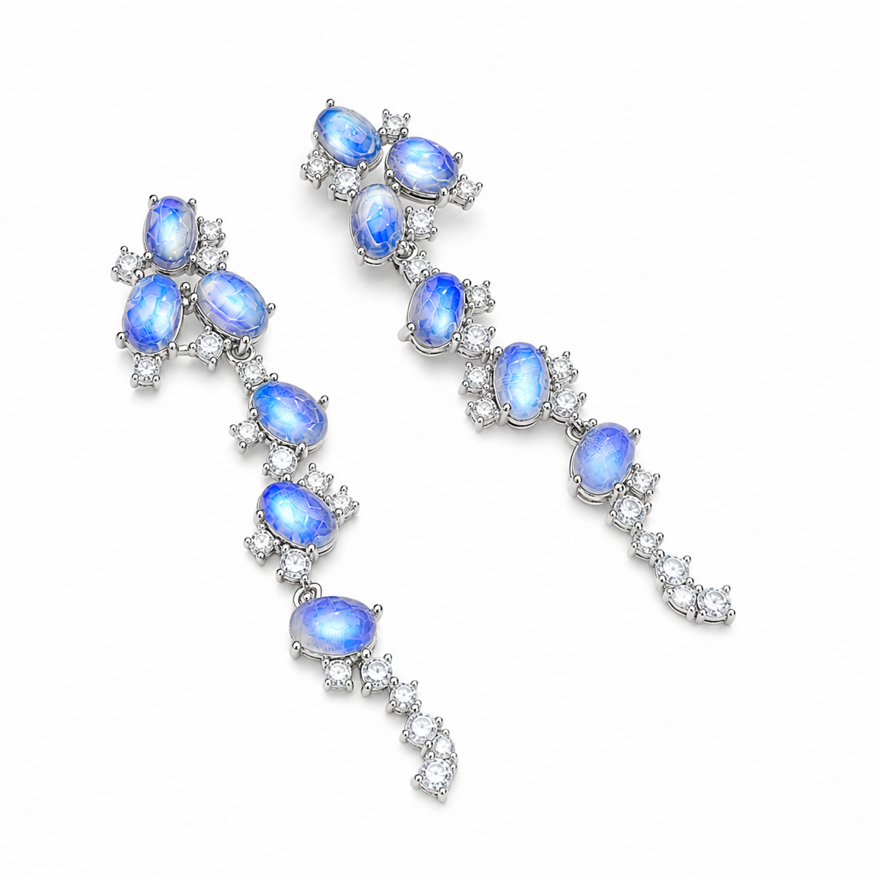 Natural Blue Moonstone stud earrings featuring genuine 4x6mm oval moonstones surrounded by high quality cubic zirconia in 925 sterling silver.
