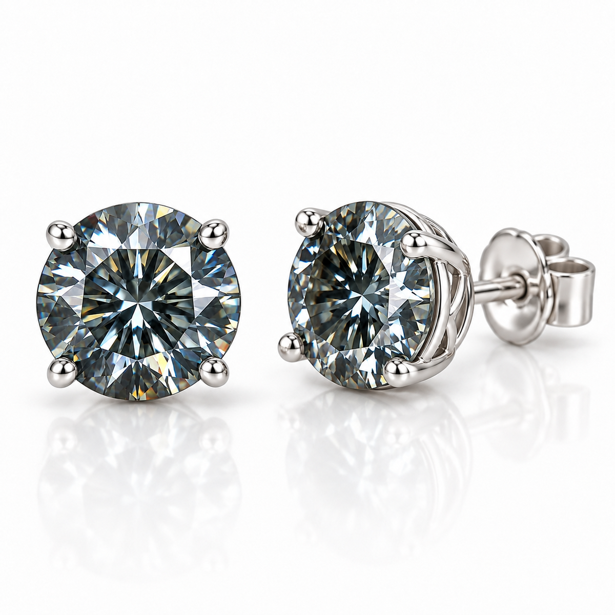 Top-down view of 1 carat each gray moissanite earrings featuring round brilliant cut 6.5mm gemstones