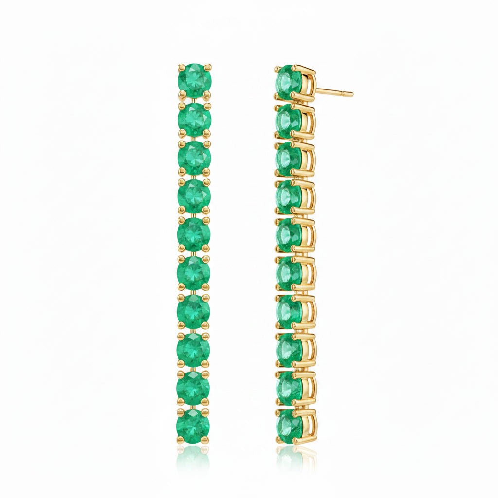 Close angled view of Phimsera 3mm round green emerald dangle earrings featuring 10 emerald gemstones on each earring