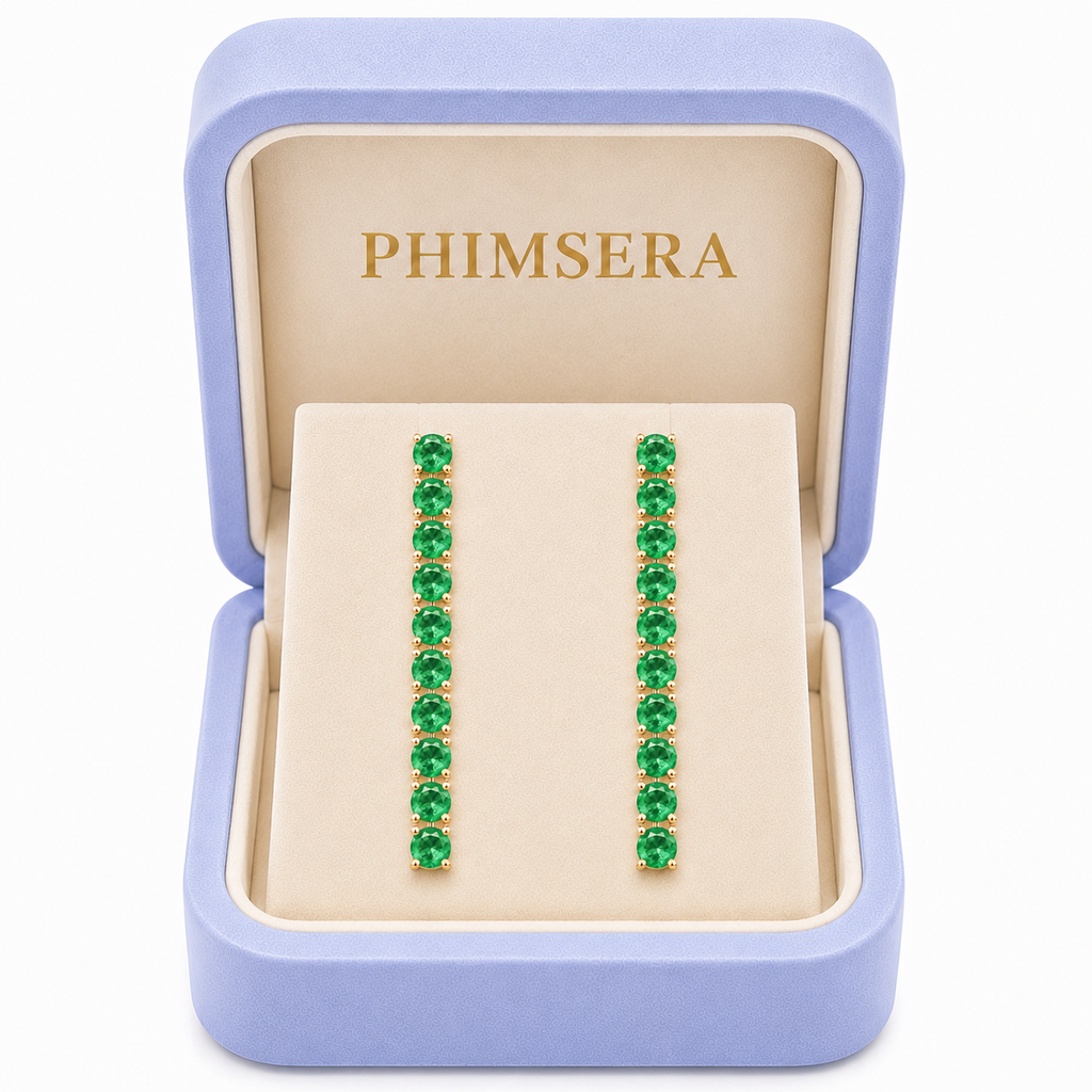 Phimsera 3mm round natural green emerald dangle earrings presented inside a Phimsera jewelry box