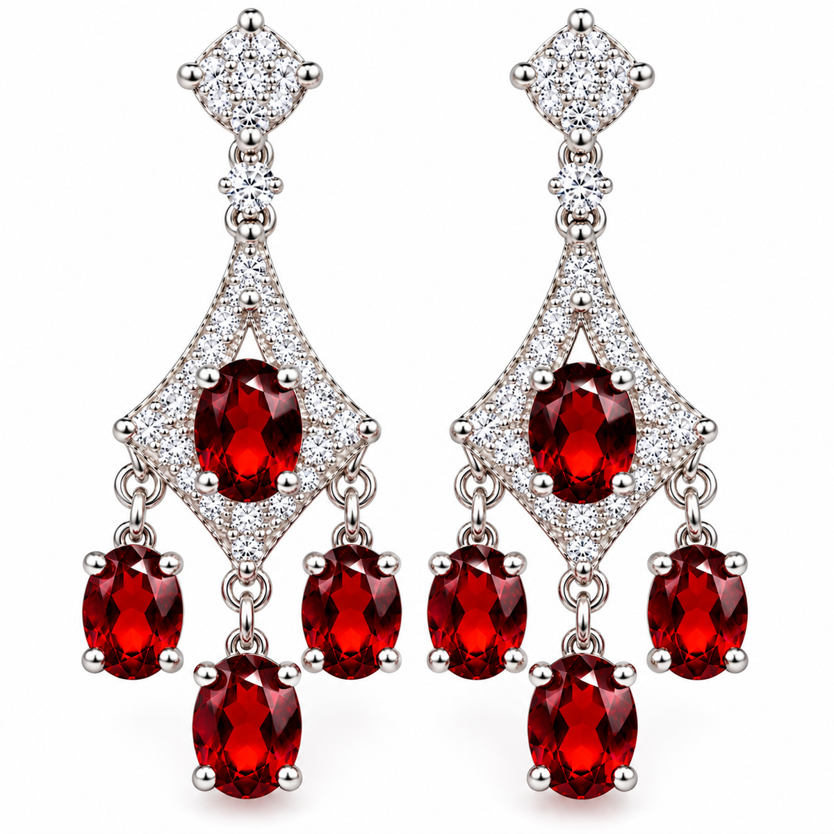 A pair of silver-tone dangle earrings featuring oval-cut deep red gemstones and pavé-set clear stones, shown on a plain white background.