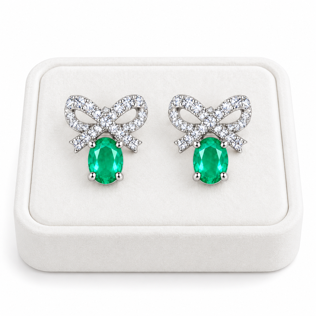 Natural Emerald 4x5mm Oval Bow Stud Earrings in 925 Sterling Silver with CZ