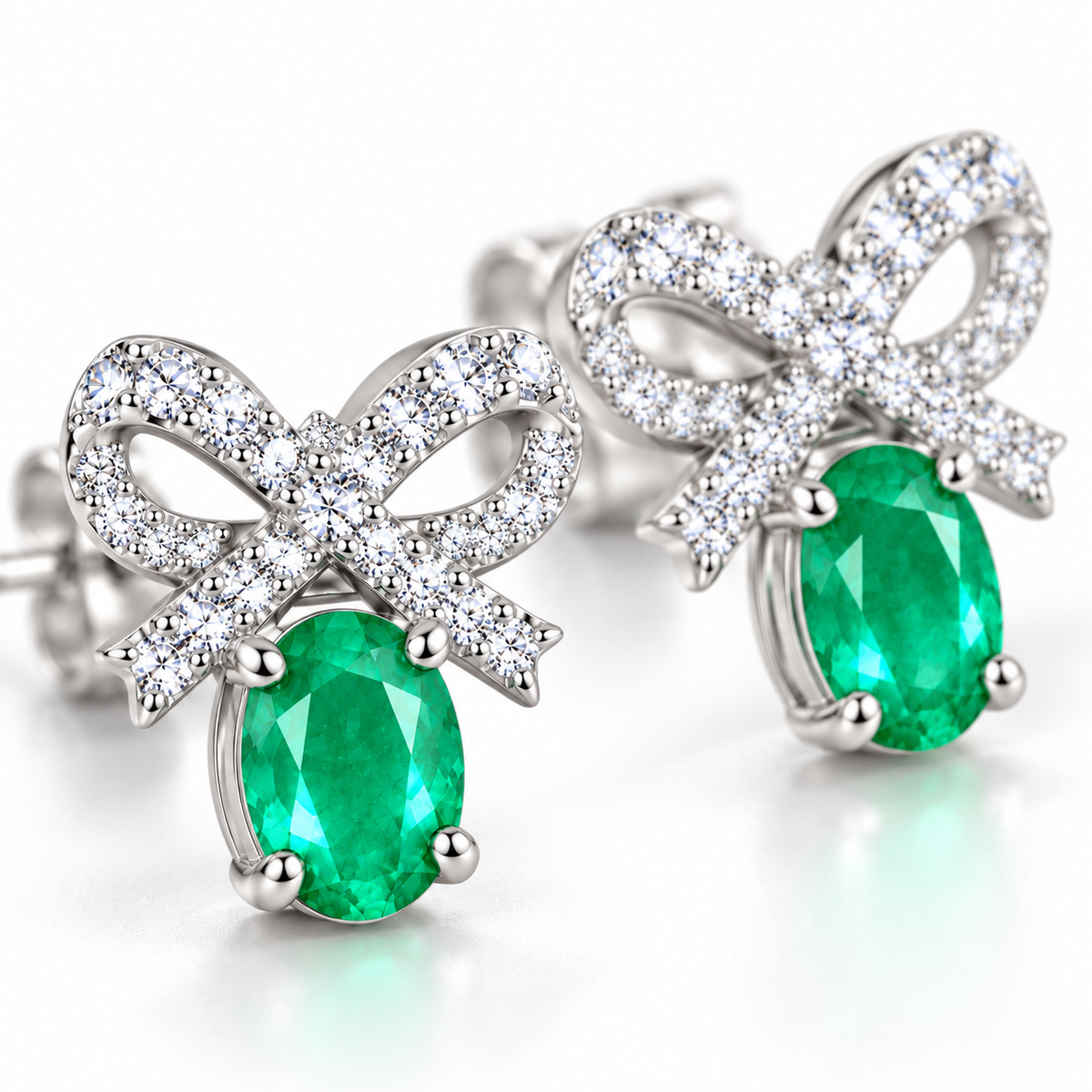 Natural Emerald 4x5mm Oval Bow Stud Earrings in 925 Sterling Silver with CZ