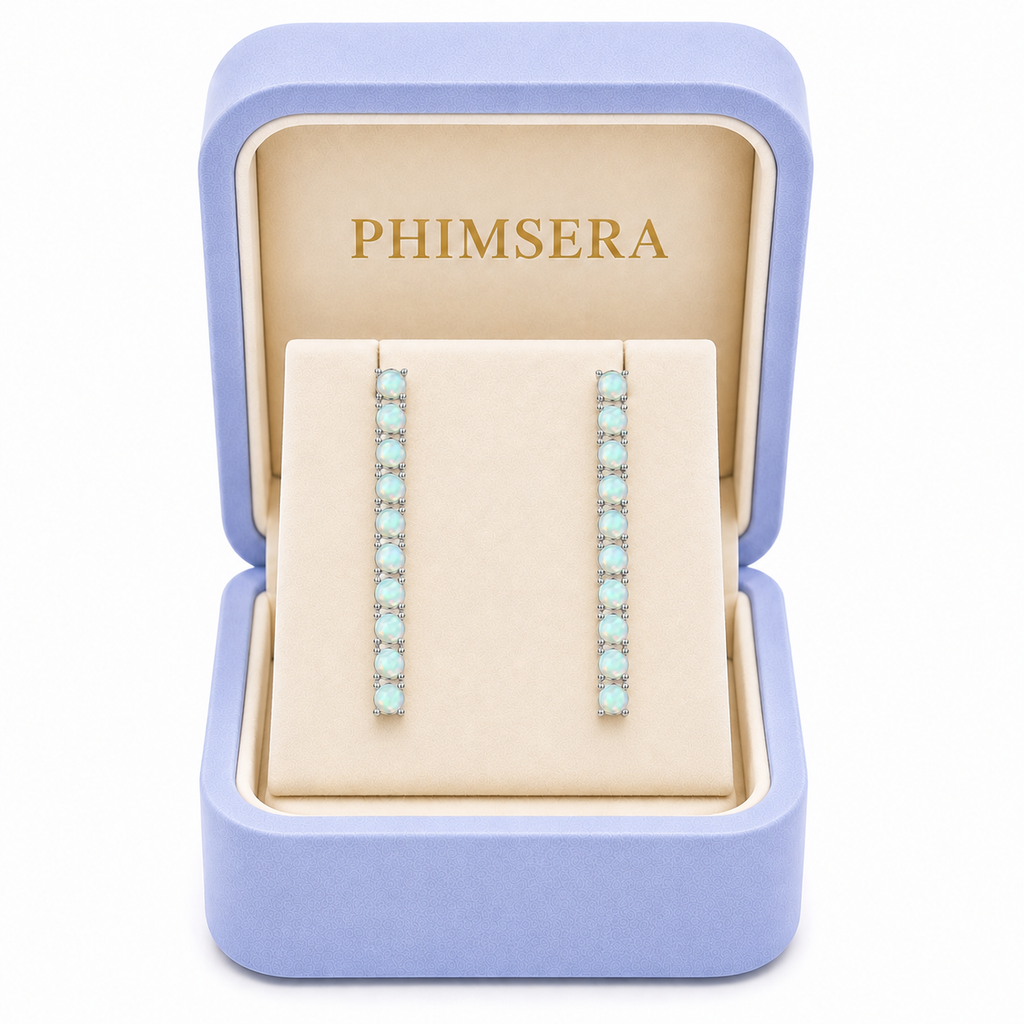 Phimsera 3mm round natural fire opal dangle earrings presented inside a Phimsera jewelry box