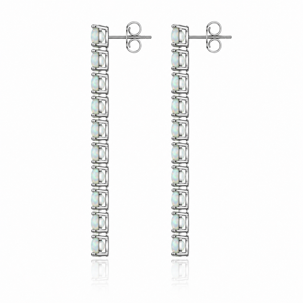Side view of Phimsera 3mm round fire opal dangle earrings showing the elongated gemstone arrangement and sterling silver settings