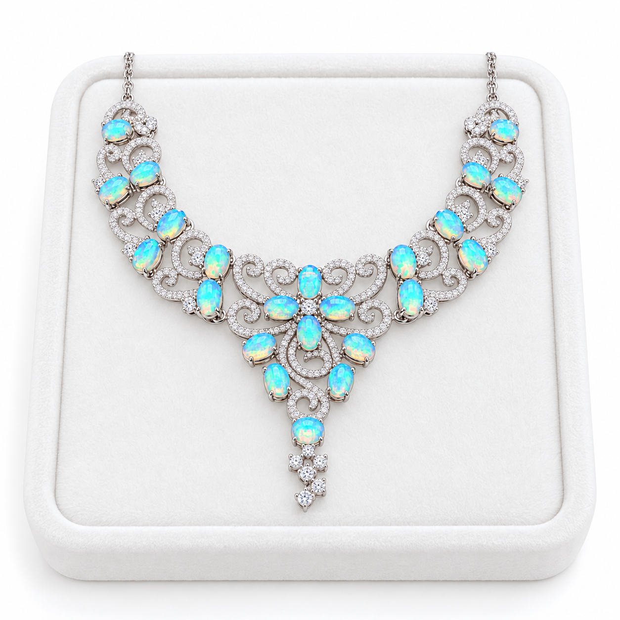 3x4mm fire opal necklace displayed on a white velvet jewelry tray