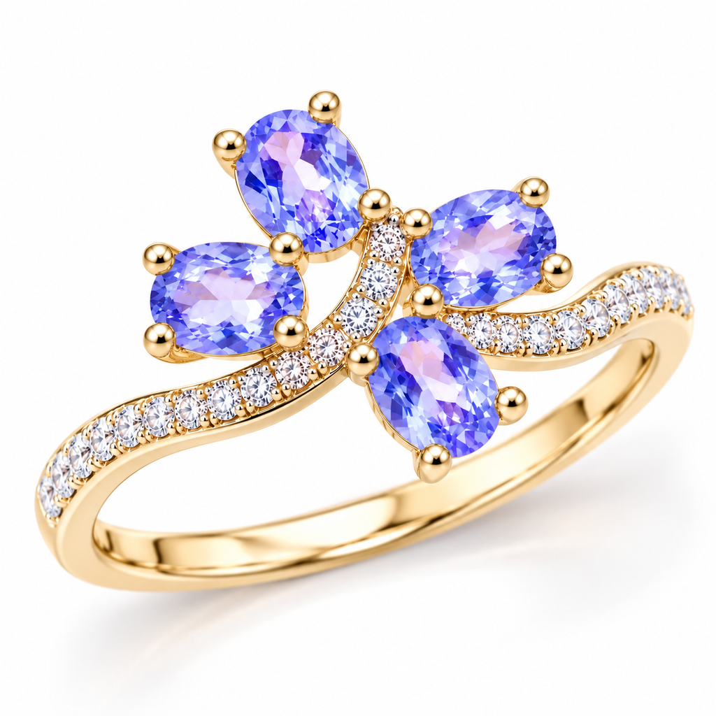 Natural purple tanzanite ring shown from a three-quarter angle with four 3×4mm oval gemstones and detailed sterling silver setting