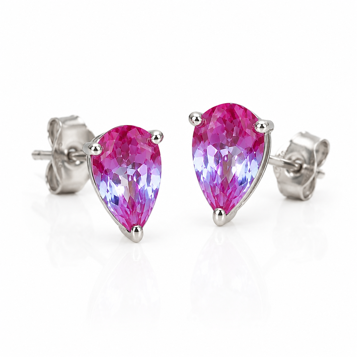4x6mm pear cut color changing lab alexandrite stud earrings at an angled view