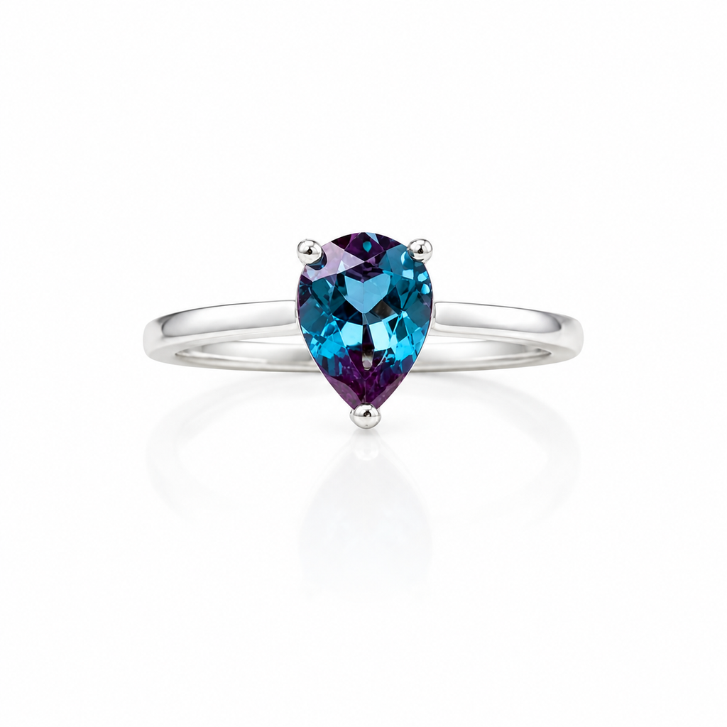 5x7mm pear cut lab alexandrite ring in 925 sterling silver on white background