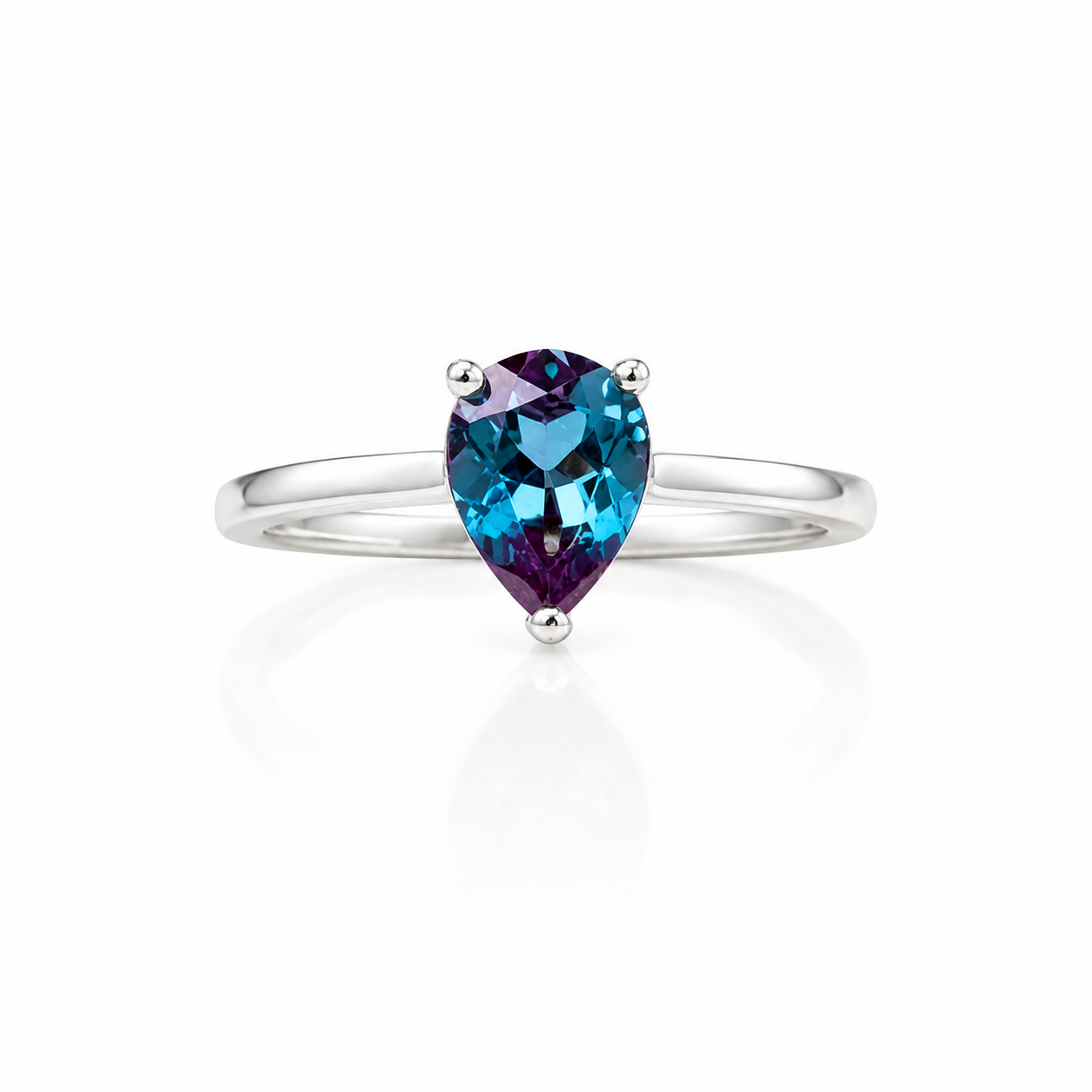 5x7mm pear cut lab alexandrite ring in 925 sterling silver on white background