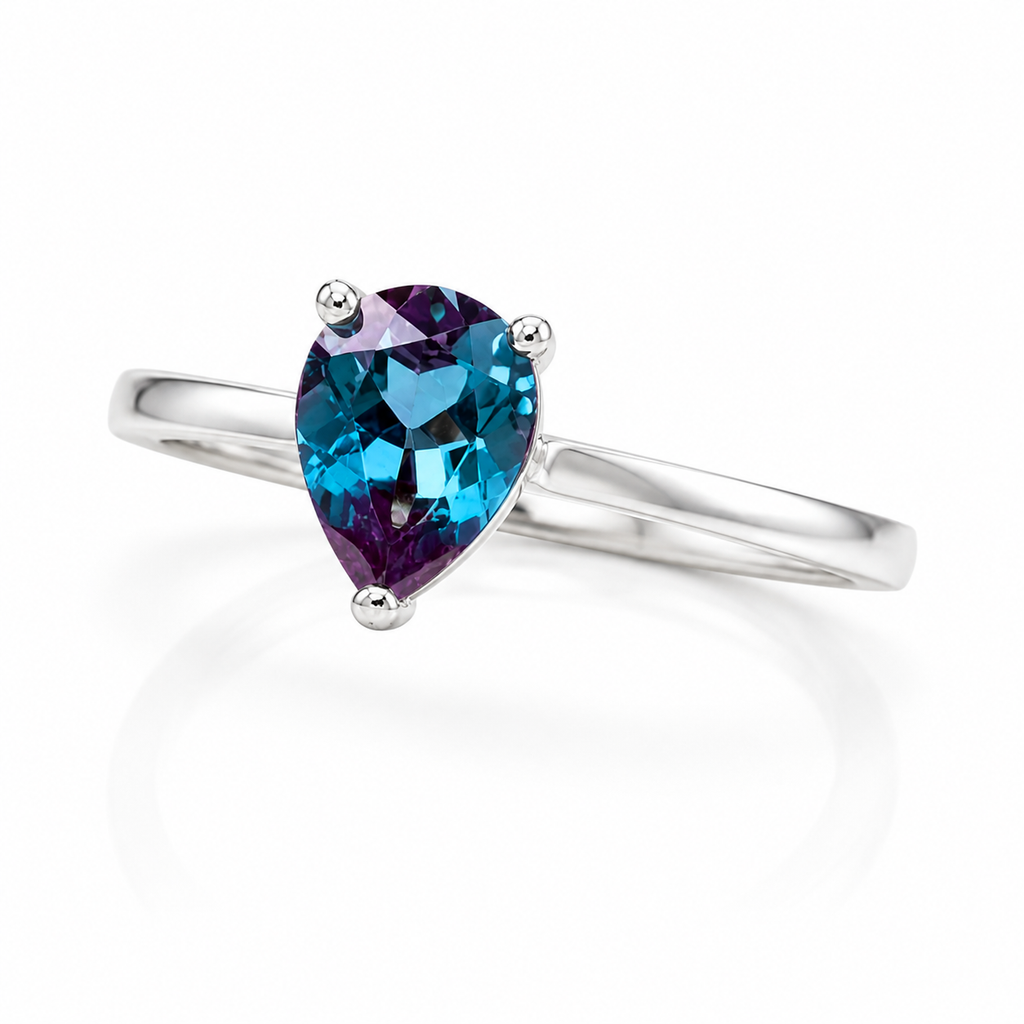 5x7mm pear shaped lab alexandrite ring showing blue teal and purple color play