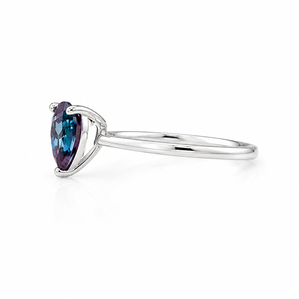 5x7mm lab created alexandrite ring side angle showing pear cut gemstone setting