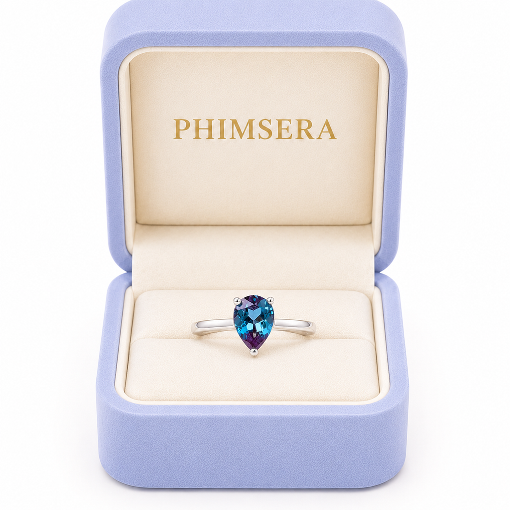 5x7mm pear cut lab alexandrite ring presented in a Phimsera jewelry box