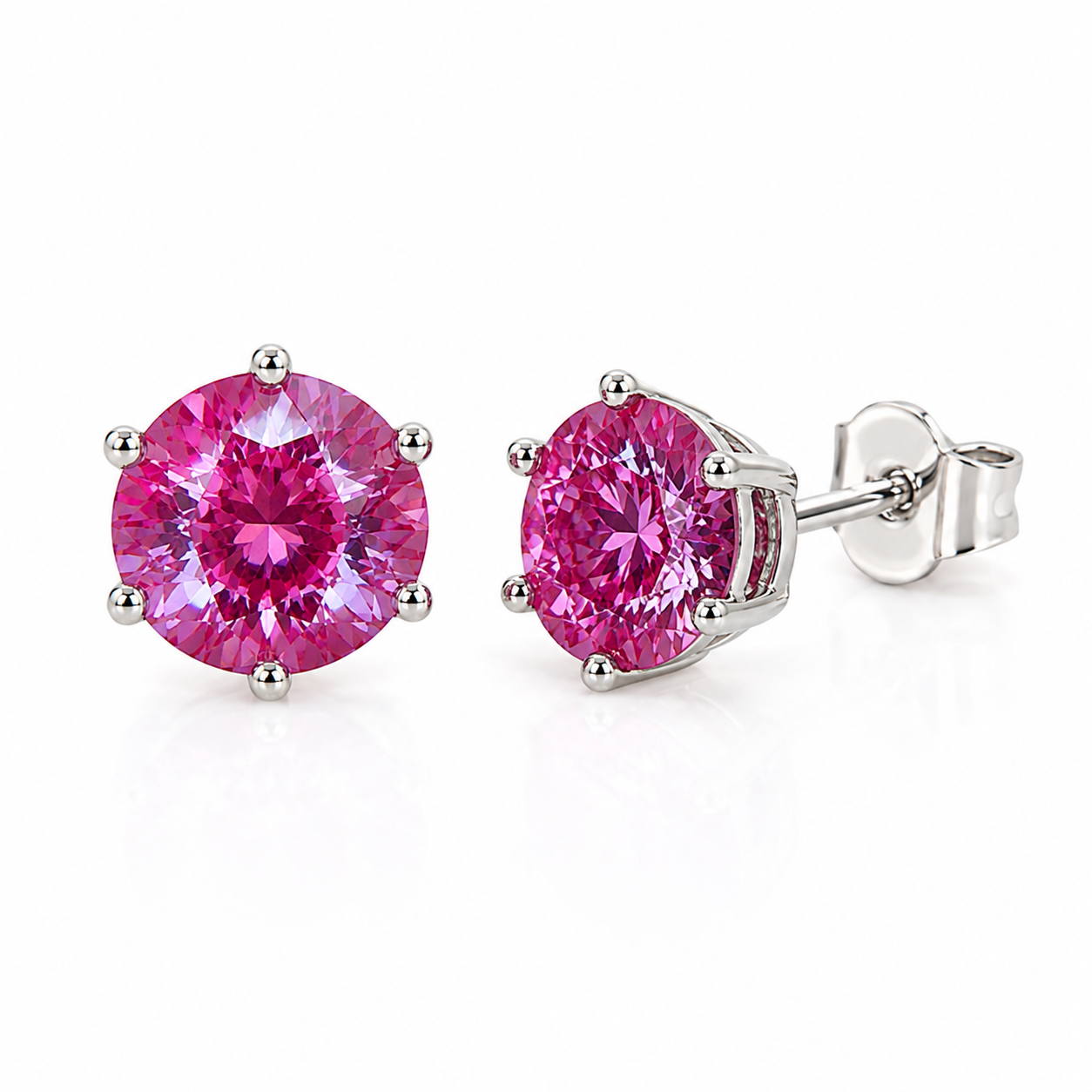 6mm lab created alexandrite heart earrings showing faceted color changing gemstones
