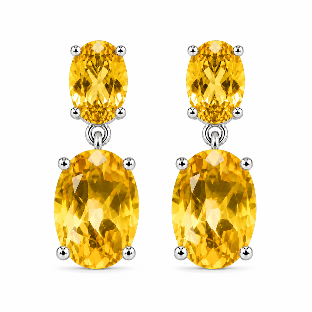 Front view of natural Citrine earrings with graduated oval gemstones