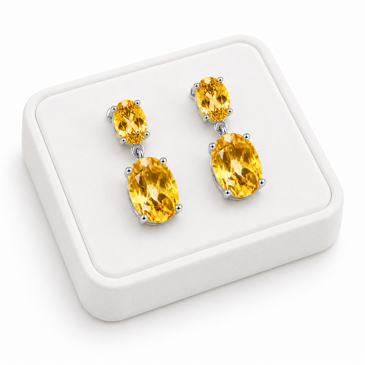 Natural Citrine dangle earrings displayed on a white velvet jewelry tray