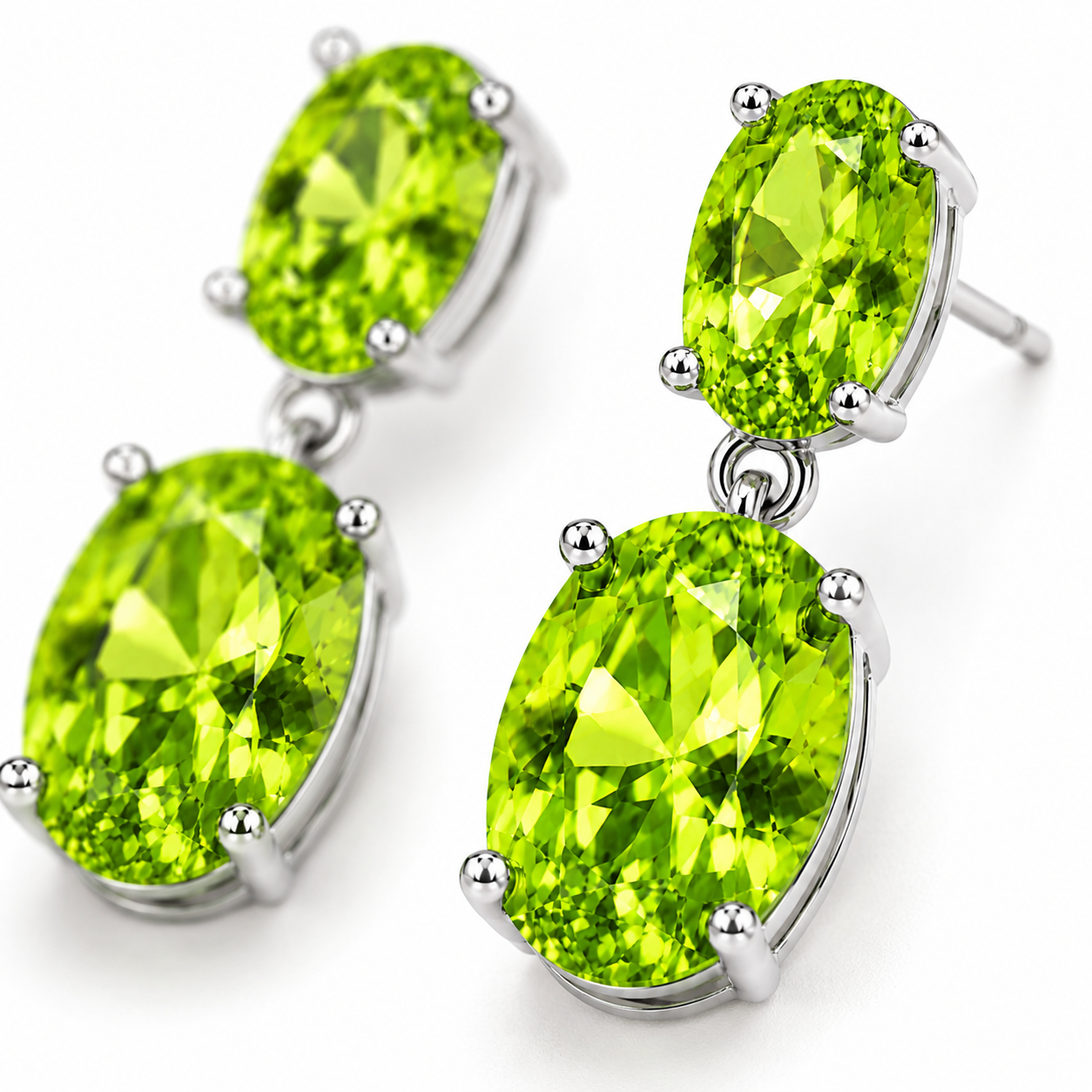 Close-up of faceted natural peridot gemstones in dangle earrings