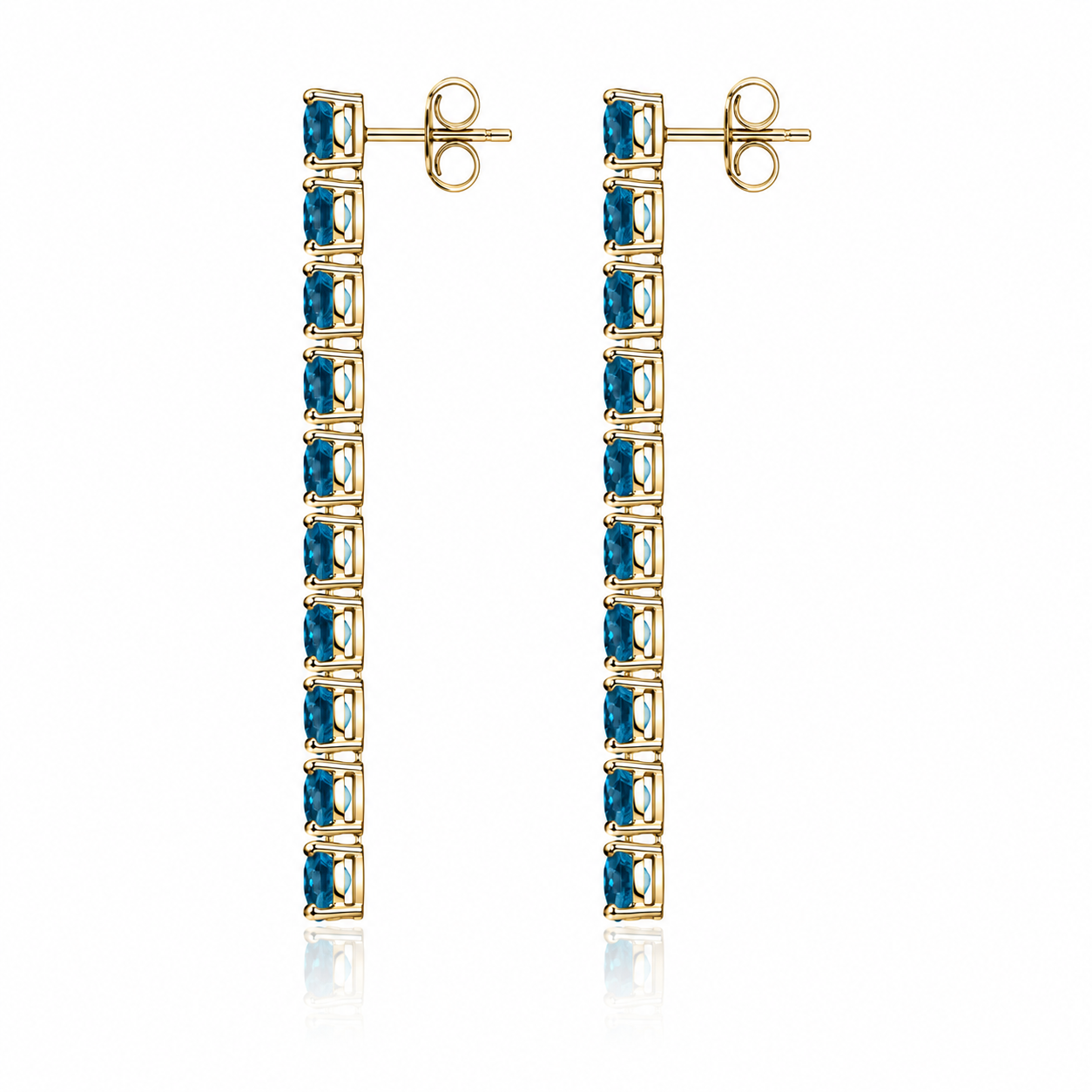 Side view of Phimsera London Blue Topaz dangle earrings showing the elongated vertical gemstone design and sterling silver settings