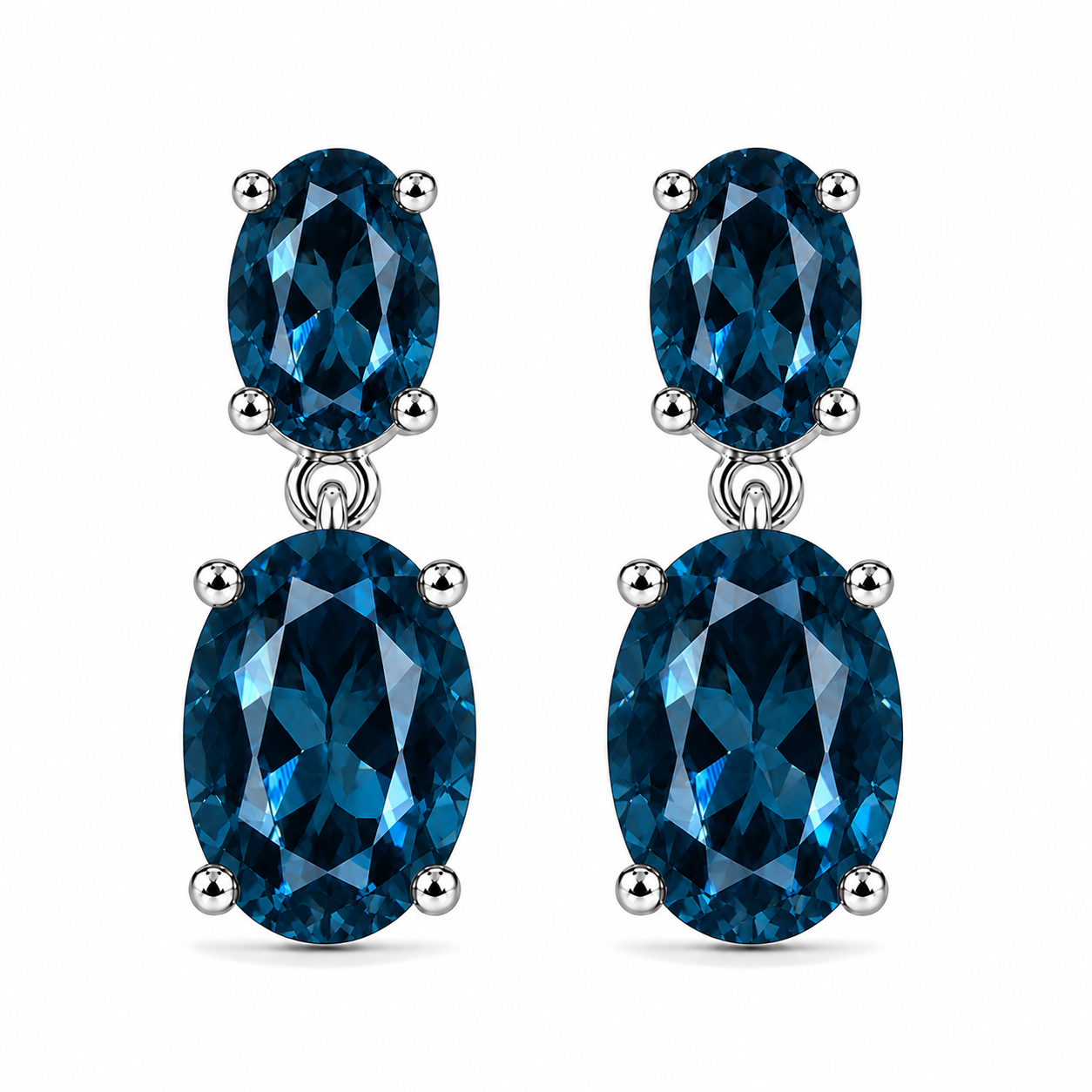 London Blue Topaz dangle earrings with 4x6mm and 8x10mm oval gemstones in sterling silver