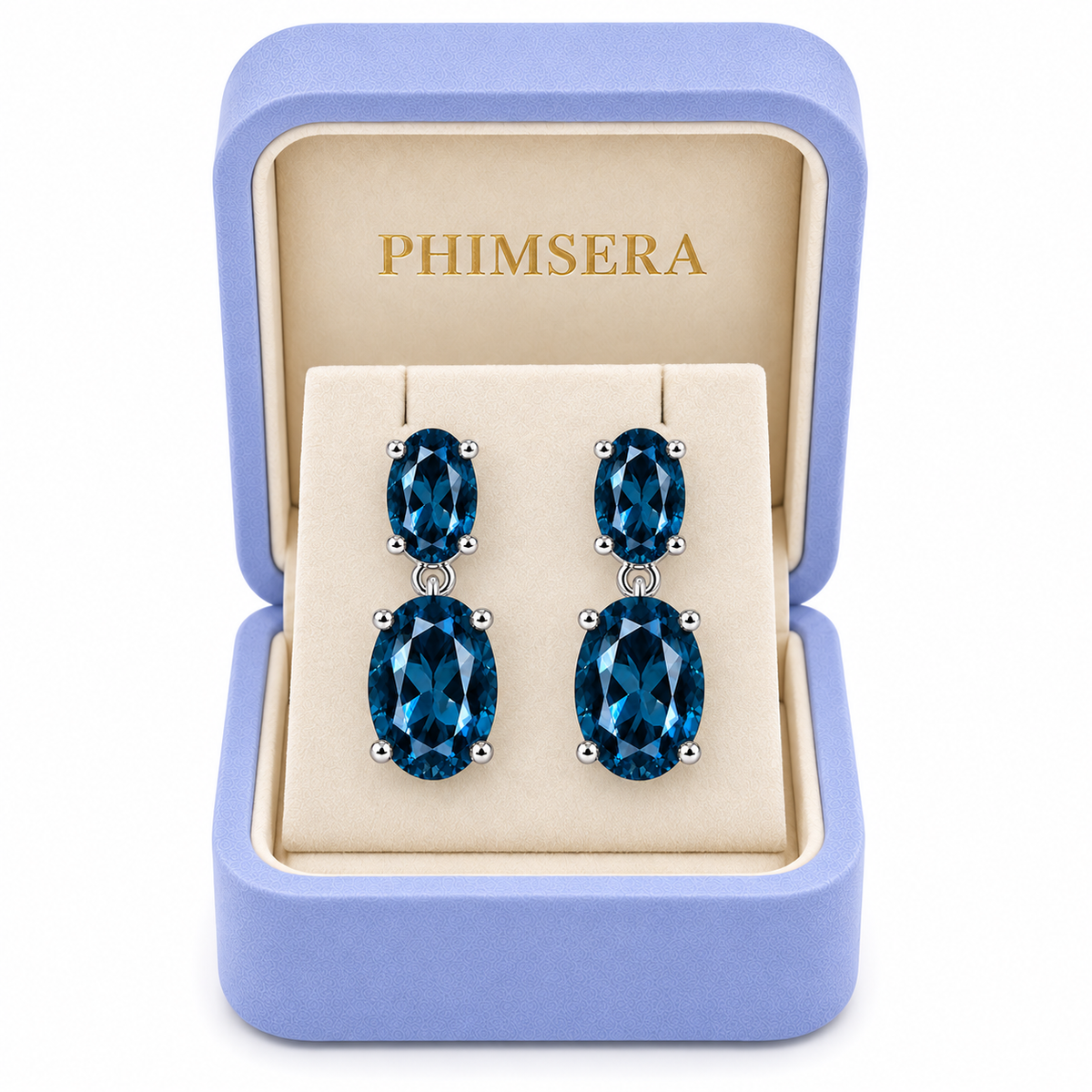 London Blue Topaz dangle earrings displayed in a Phimsera jewelry box