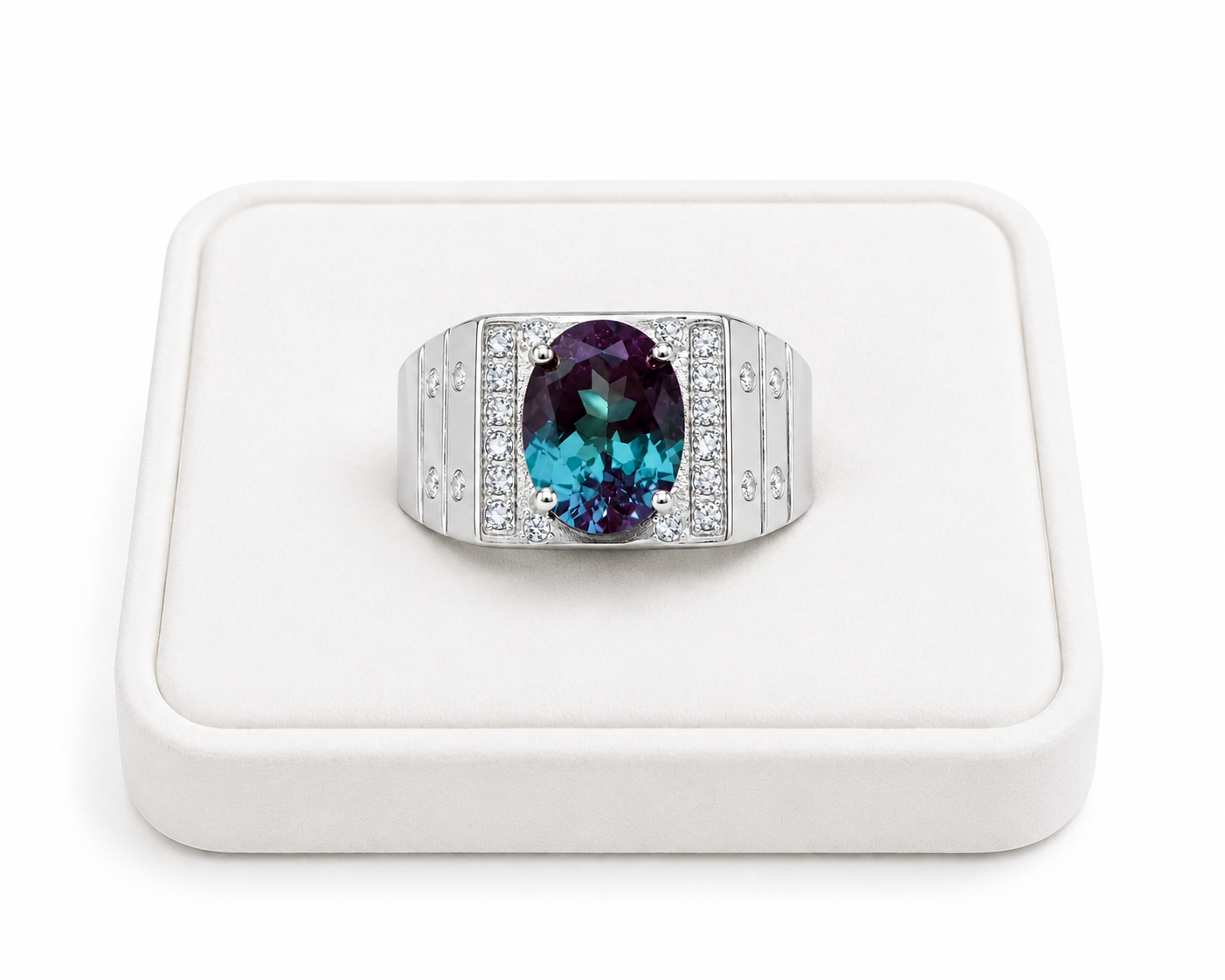 8x10mm Lab Alexandrite men's ring displayed on white velvet jewelry tray