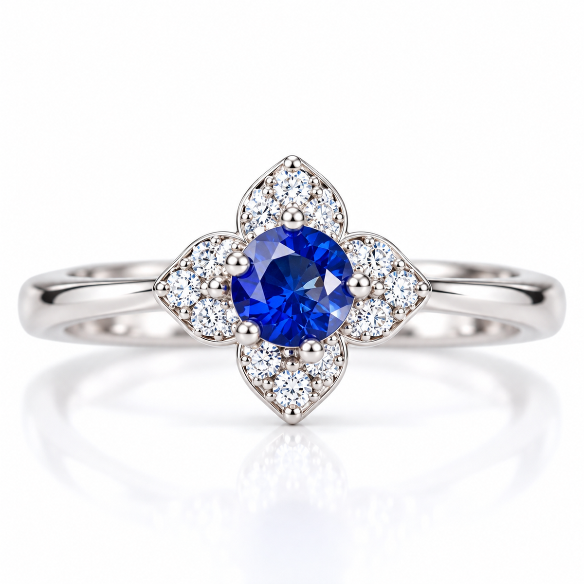 Natural 3.5mm round blue sapphire floral ring in 925 Sterling Silver on a white background