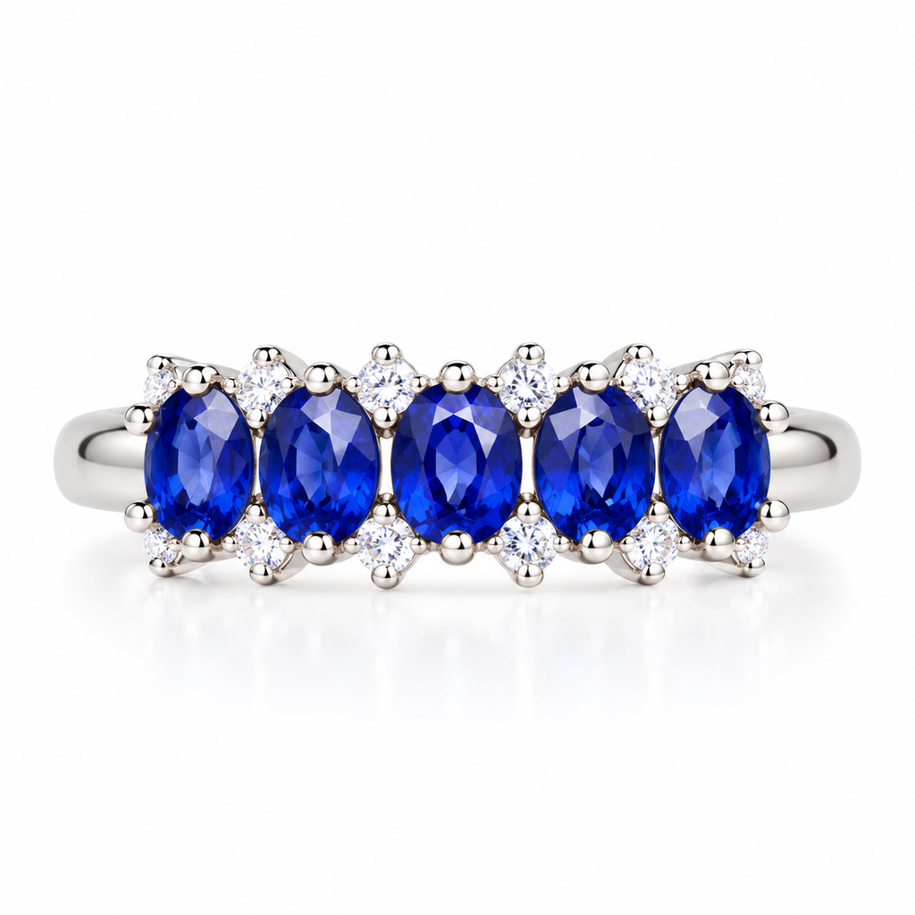 Natural 3×4mm blue sapphire band ring with oval gemstones in 925 Sterling Silver on a pure white background