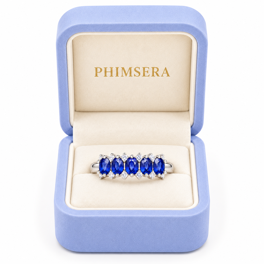 Natural 3×4mm blue sapphire band ring presented inside a Phimsera jewelry gift box