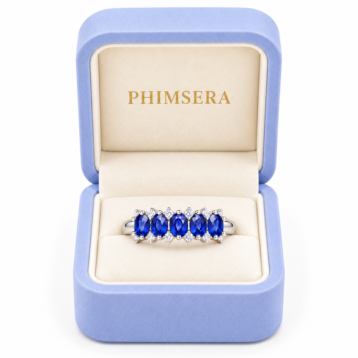 Natural 3×4mm blue sapphire band ring presented inside a Phimsera jewelry gift box
