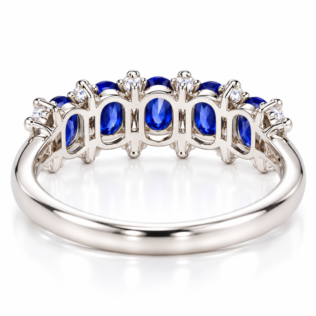 Detailed underside view of a natural blue sapphire band ring showing the gemstone settings and 925 Sterling Silver construction