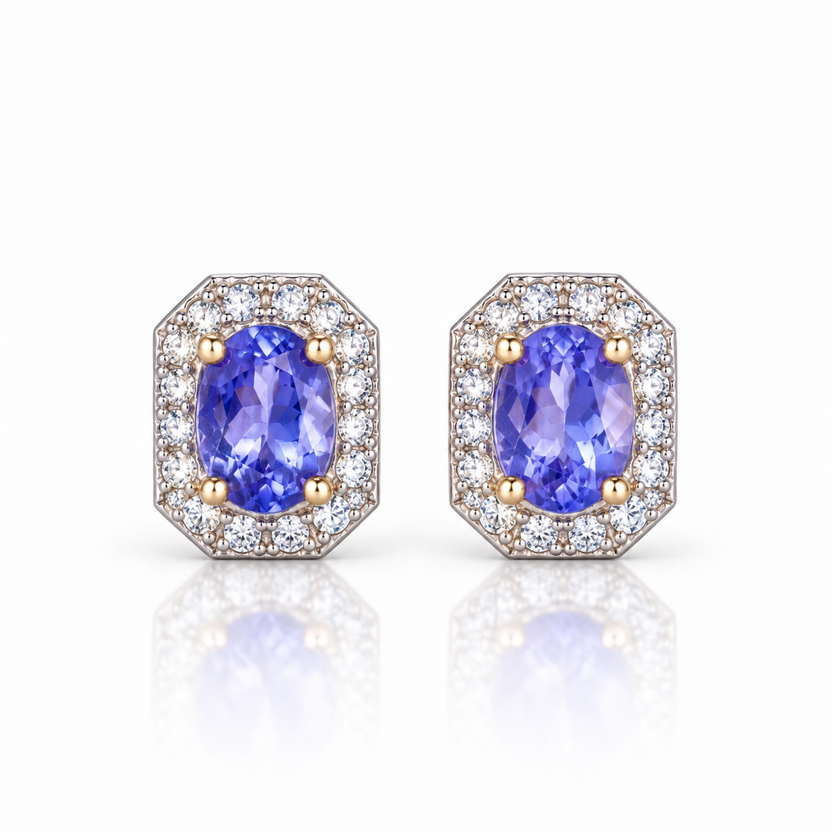 Natural 4×5mm violet-blue tanzanite stud earrings with octagonal halo and gold-toned prongs in 925 sterling silver on a white background