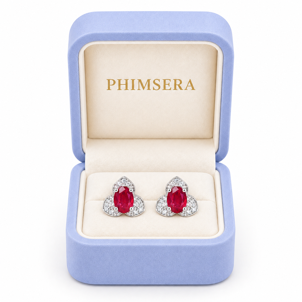 Phimsera natural ruby stud earrings presented in an elegant Phimsera jewelry box