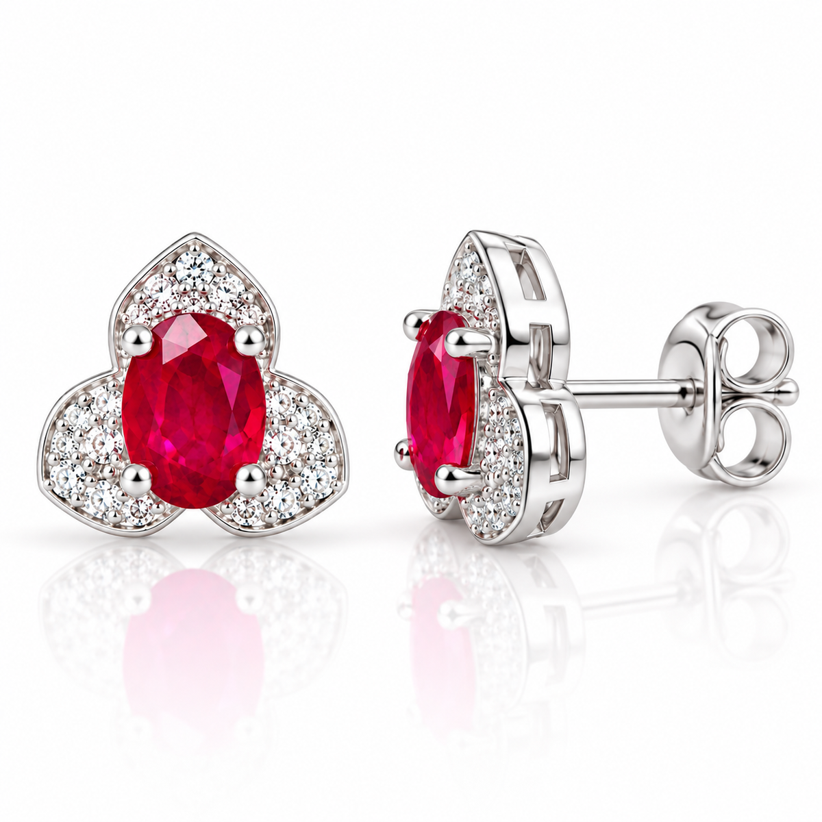 Side profile of natural ruby stud earrings featuring 4×6mm oval ruby gemstones, cubic zirconia accents, and 925 sterling silver settings
