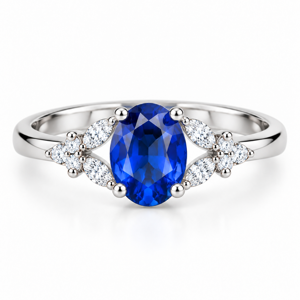 Top view of 5x7mm blue sapphire ring featuring oval gemstone and detailed side accents